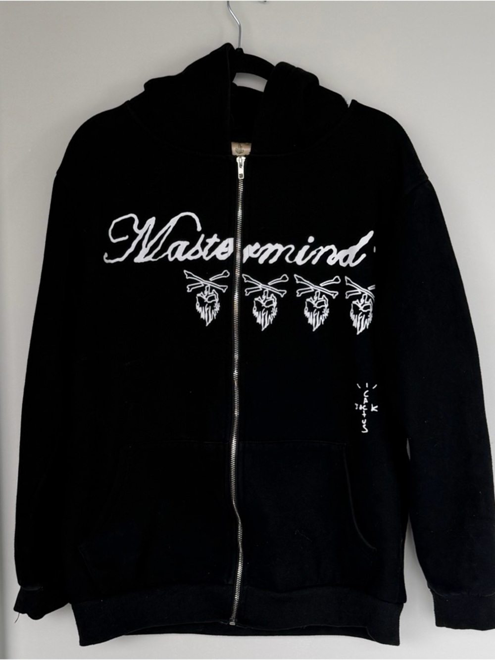 hypebeast black zip-up hoodie with white script logo